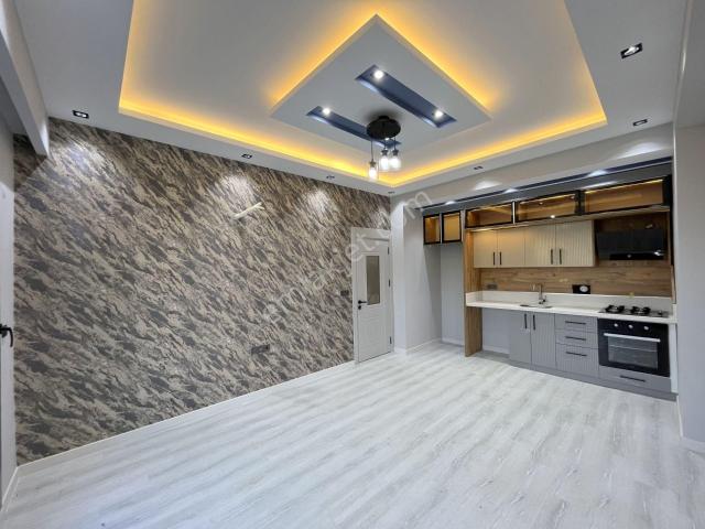 Güç Gayrimenkul'den Zeytinli'de Doğa İle İç İçe Cam Balkonlu Lüx Satılık 1+1 Daire