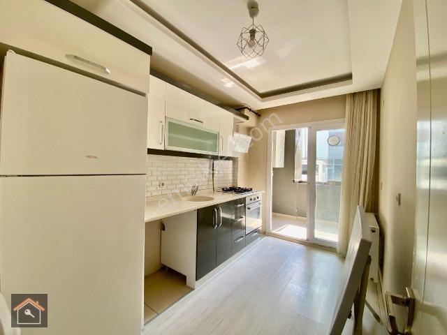 Günay Emlak'tan Torbalıda Merkezi Konumda Eşyalı Doğalgazlı 2 +1 100 M2 Kiralık Daire