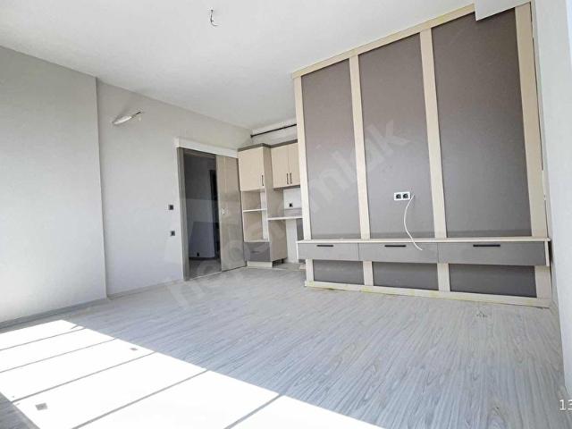 GÜNEY'DEN CAZİP PTT EVLERİ MERKEZİ KONUMDA FIRSAT DAİRE