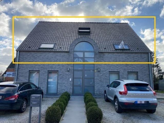 Gunstig gelegen dakappartement met autostaanplaats