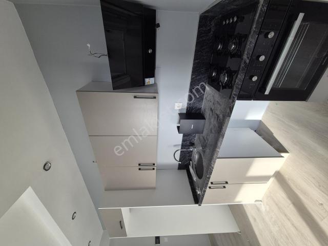 Gültepe'de 1+1 Yüksek Kredili Klima Ve Ankastreli Satılık Daire