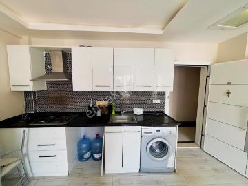 Gültepede~site~içerisinde~cadde~yanı~1+1~eşyalı~geniş~daire