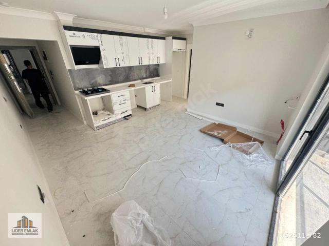 GÜLVERENDE 1+1 YERDEN ISITMALI MERKEZİ KONUMDA KAPALI OTOPARK