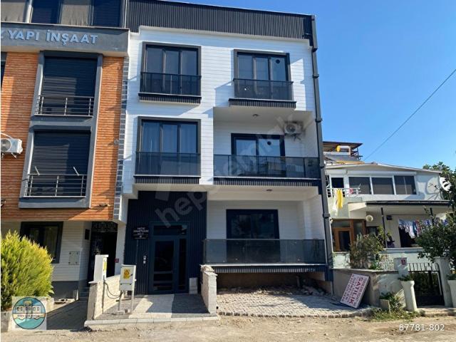 GÜRE IŞIK EMLAKTA GÜRE AKÇAY ARASI YÜKSEK GİRİŞ DENİZE YAKIN 2+1 DAİRE