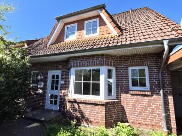 Gut geschnittene Doppelhaushälfte in Huntlosen