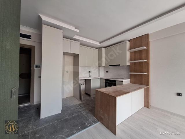 GÜVENLİKLİ SİTE İÇERİSNDE BULVARA YAKIN LÜX ARA KAT 1+1 SATILIK