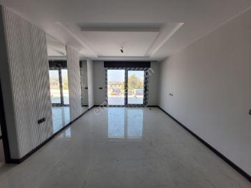 Güzelçamlı'da Deniz Manzaralı Geniş Teraslı Yeni Daire