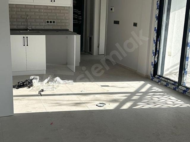 GÜZELÇAMLI DA SATILIK DOĞA MANZARALI 1 + 1 DAIRE