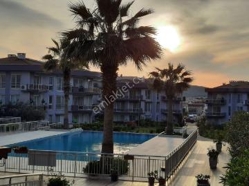 Güzelbahçe Yelki’de Havuzlu Sitede 3cephe 3+1 Satılık Köşe Daire