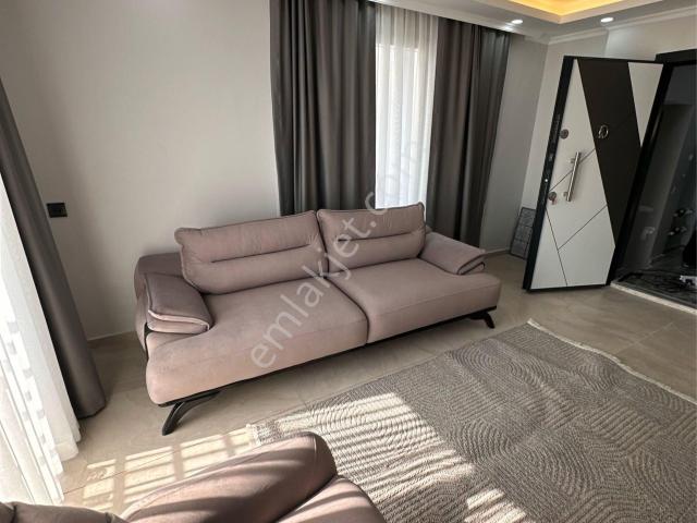 Güzelyalı’da Merkezi Konumda Sıfır 1+1 Eşyalı Kiralık Daire