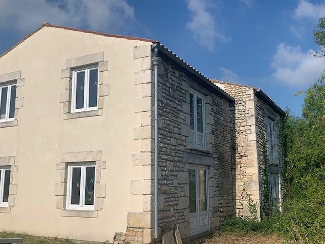 Ensemble Immobilier composé de 11 Maisons Anciennes à finir