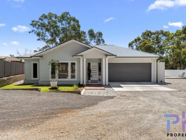 HAMPTONS ELEGANCE WITH POOLSIDE LIVING IN SOUGHT AFTER MAIDEN GULLY!
