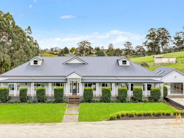 Hamptons Inspired Acreage Living with Exceptional Future Potential !