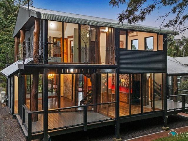 Handcrafted Timber Masterpiece Backing onto Rainforest