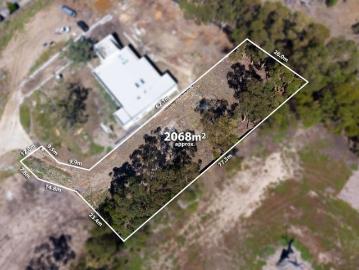 Half Acre Block in a Prime Position!