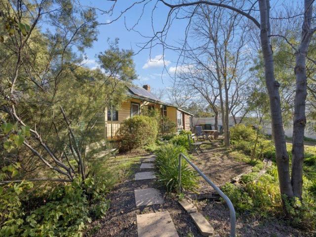 Half Acre Sanctuary with Endless Opportunity!