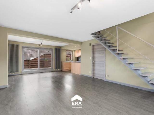 Halfopen woning met terras