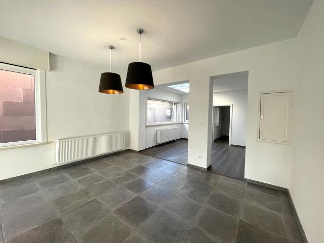 HALFOPEN BEBOUWING MET 2 SLAAPKAMERS EN TUIN