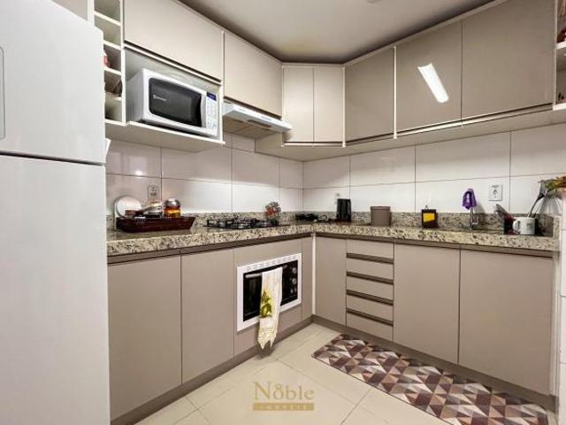 Harmonia Residencial: Seu Apartamento de 2 Quartos + Escritório e Estacionamento