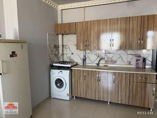 Hassa şehir merkezinde eşyalı 1+1 ara kat kiralık daire