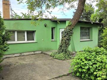 Hauptstadtmakler Befristet vermietetes Haus auf schönen Grundstück