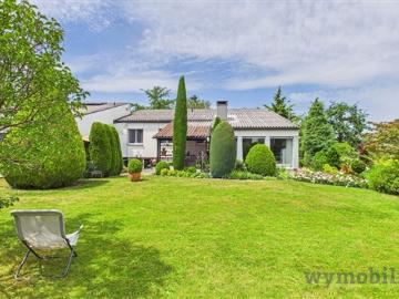 Haus mit einzigartiger Architektur und traumhaftem Garten