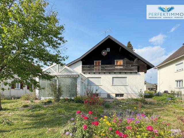 Haus mit großem Garten und Gestaltungspotenzial