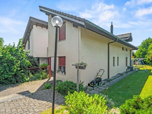 Haus mit grossem Umschwung zentral gelegen