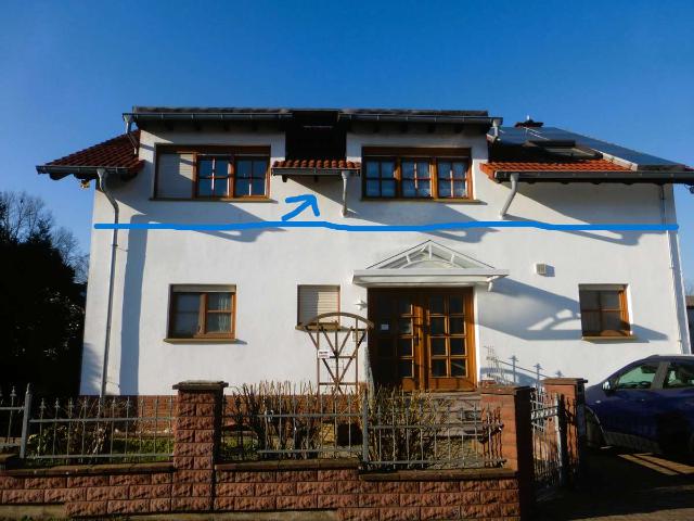 Haus / Eigentumswohnung mit Balkon, Garten und besonderer Architektur