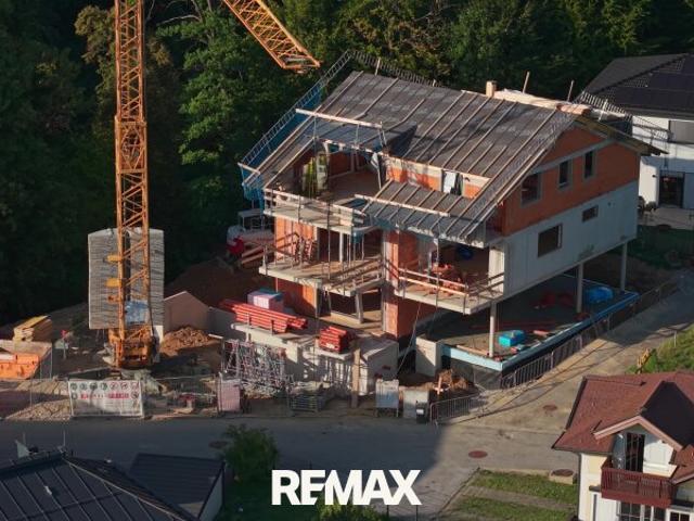 HAUS IM HAUS: 5 Zimmer Maisonette mit eigenem Privatgarten — Erstbezug in Elixhausen
