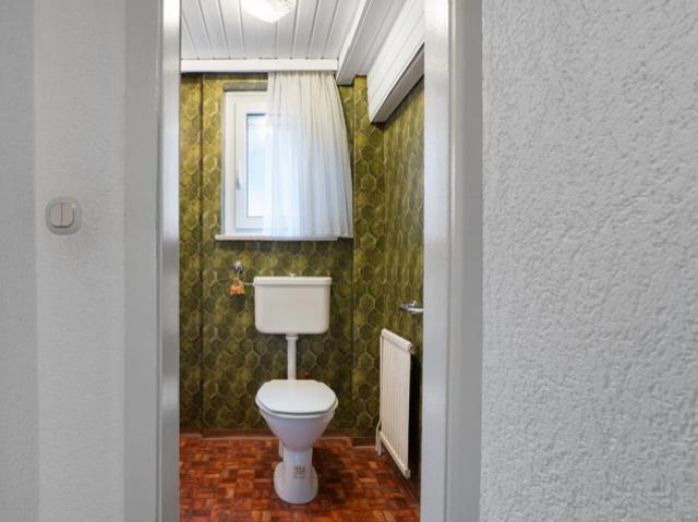 Haus in Rankweil mit Garten, Garage & Bergblick – Renovierungsprojekt mit viel Potential