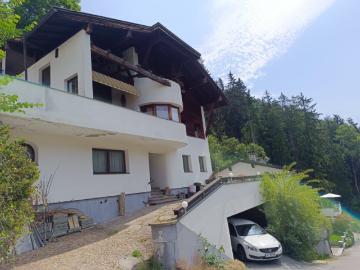 Haus in 0mes 180m² mit Garten, Garage und atemberaubendem Bergblick!