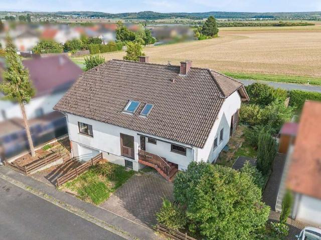 Haus zum Kaufen in Hungen Utphe 299.000,00 EUR 210 m²