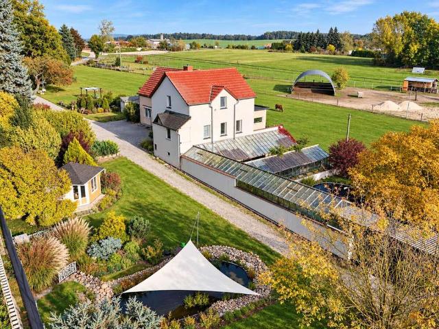 Haus zum Kaufen in Ottendorf Okrilla 450.000,00 EUR 100 m²