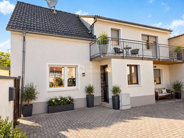 Haus zum Kaufen in Münster bei Dieburg 345.000,00 EUR 170 m²