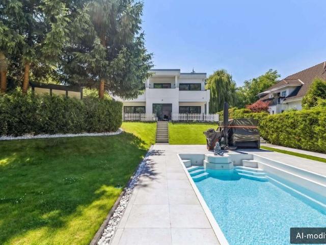 Haus zum Kaufen in Neuenhagen bei Berlin 990.000,00 EUR 215.32 m²