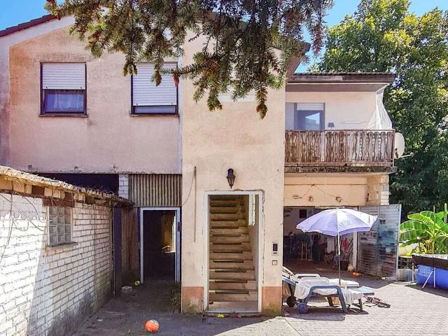Haus zum Kaufen in Rodgau 350.000,00 EUR 110 m²