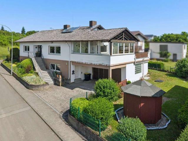 Haus zum Kaufen in Wölfersheim 424.500,00 EUR 136.44 m²