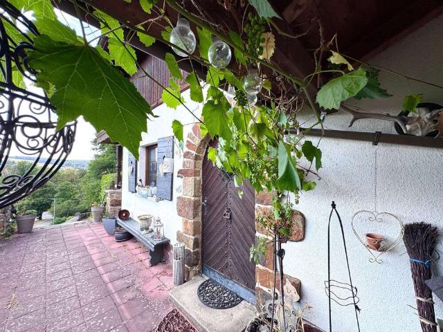 Haus zum Kaufen in Waldsolms 290.000,00 EUR 120 m²