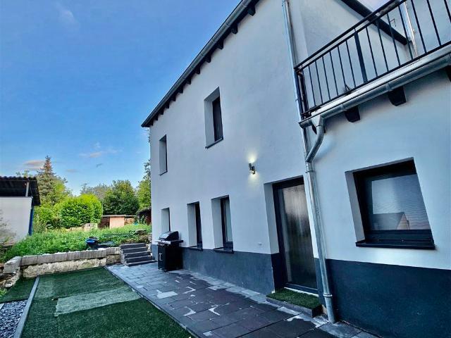 Hausgefühl: Kernsanierte Maisonette mit Garten & Dachterrasse