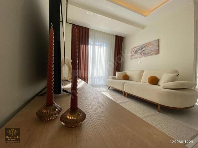 HAVUZLU SİTE İÇERİSİNDE SIFIR KONSEPT EŞYALI KİRALIK 2+1