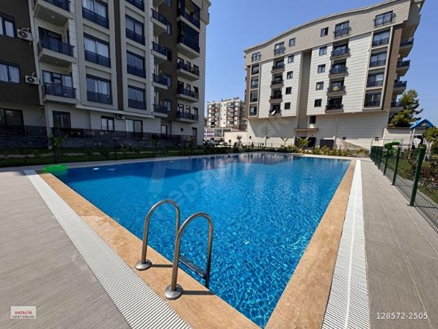 HAVUZLU SİTE İÇİ 1+1 1.KAT ASANSÖRLÜ,KAMELYALI,ÇOÇUK OYUN PARKLI,GÜNEY CEPHELİ KİRALIK DAİRE