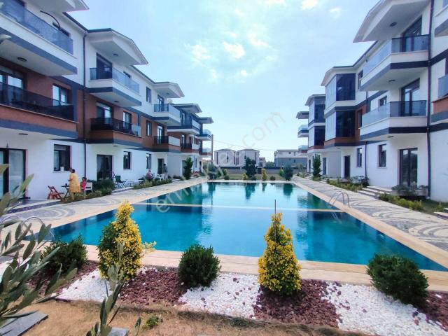 Havuzlu Sitede Bahçe Katı Eşyalı 1+1 Daire Kartallar'dan.