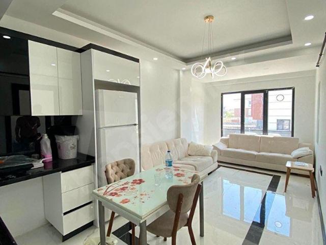 HAVUZLARDA SATILIK 1+1 AMERİKAN MUTFAKLI LÜX SATILIK DAİRE