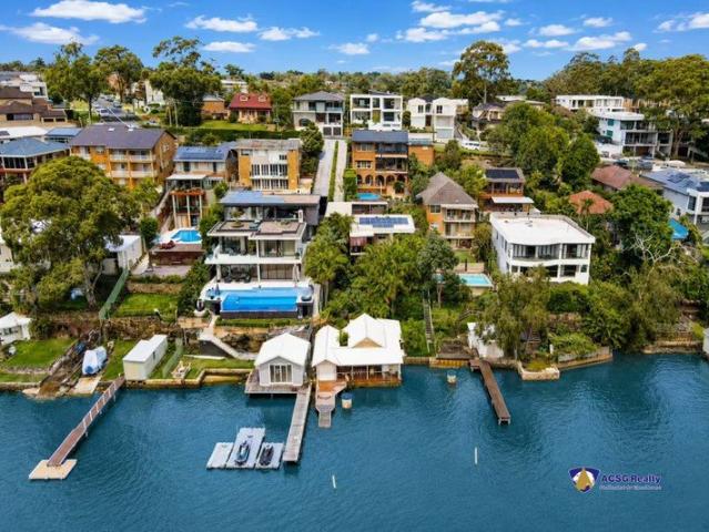 Headline: Waterfront Luxury Meets Modern Resort Living
