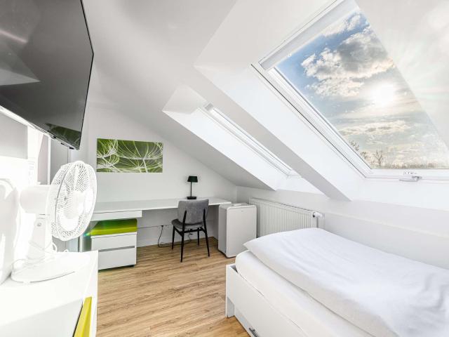 HEGERICH: Stilvolles, modernes Apartment mit garantierten Mieteinnahmen am Golfplatz Fürth