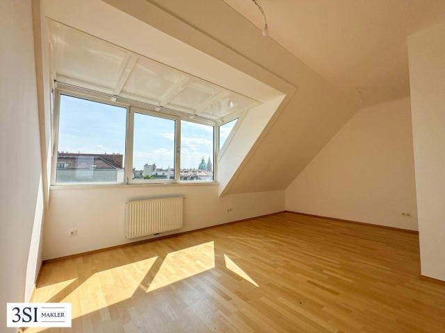 Hell, klimatisiert, großzügig 2 Zimmer Dachgeschosstraum in ruhiger Seitenstraße des 10. Bezirks mit allgemeiner Dachterrasse