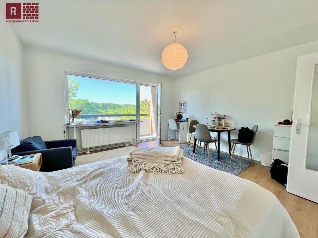 Sonnige 3 Zimmer Wohnung mit zwei Balkonen, Aufzug & Garage in ruhiger Wohnlage