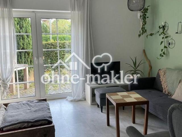 Helle 2 Zimmer Wohnung mit Terrasse und Garten