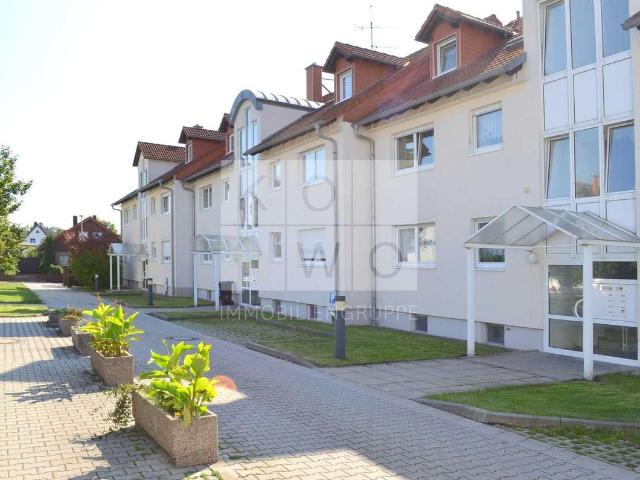 Helle 2 Zimmer Wohnung mit Terrasse und eigenem Gartenanteil
